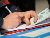 В Украине уменьшили тарифы на платные услуги ГАИ