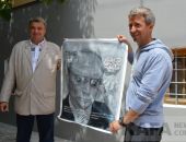 В Феодосии известный американский художник передал В.Путину его портрет